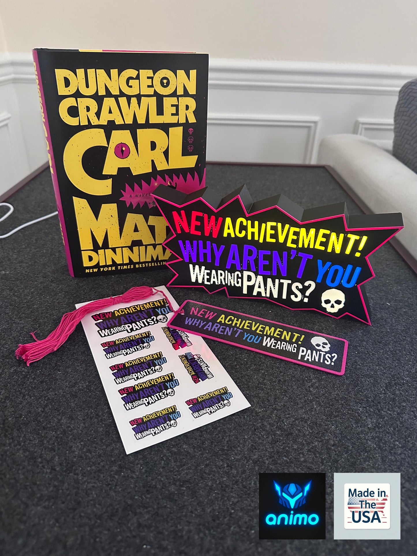 Dungeon Crawler Carl Funny Achievement Bundle – "Why Aren't You Wearing Pants?" Gift Set – Lightbox, 3D Bookmark, & Sticker Pack