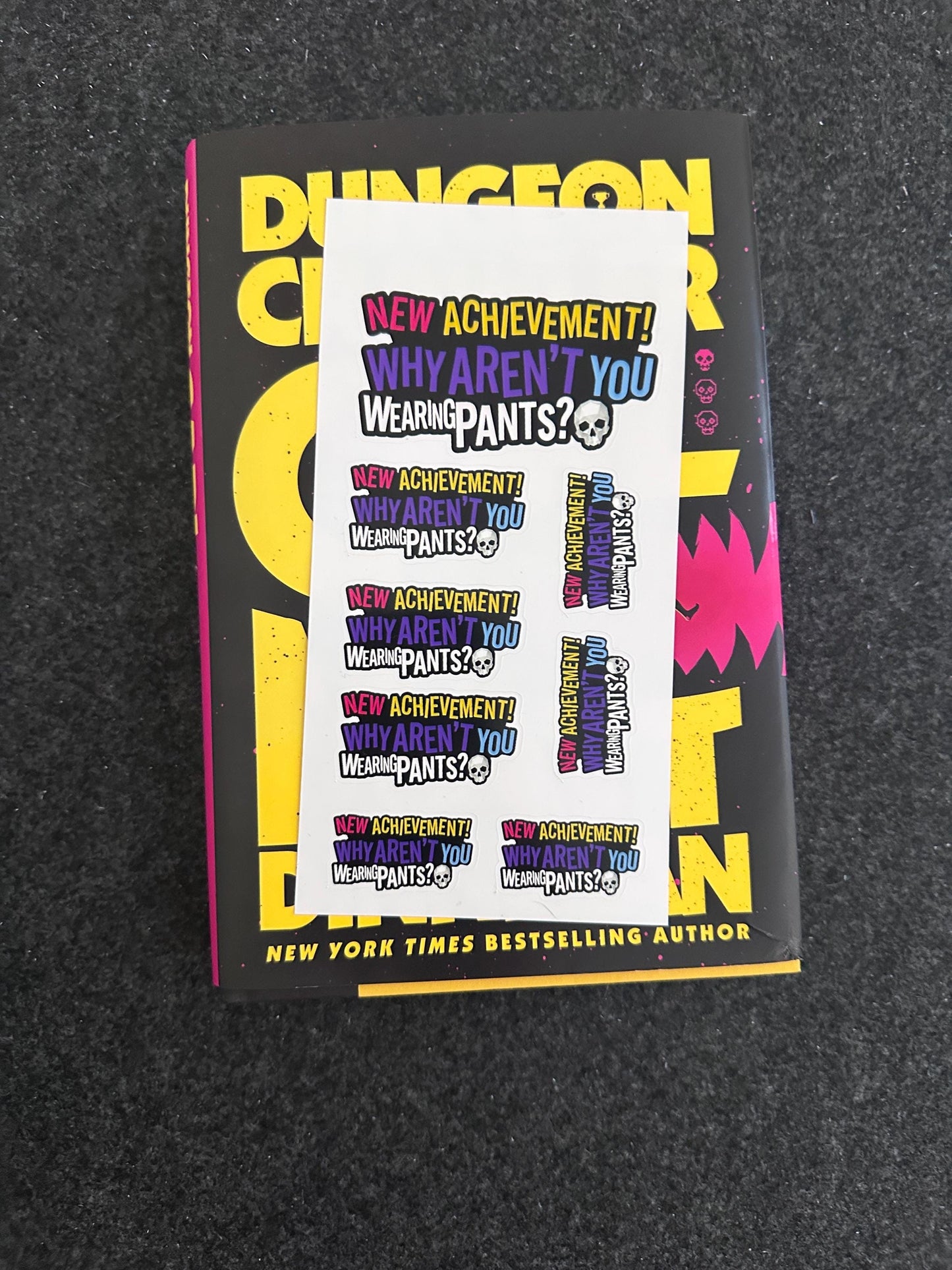 Dungeon Crawler Carl Funny Achievement Bundle – "Why Aren't You Wearing Pants?" Gift Set – Lightbox, 3D Bookmark, & Sticker Pack